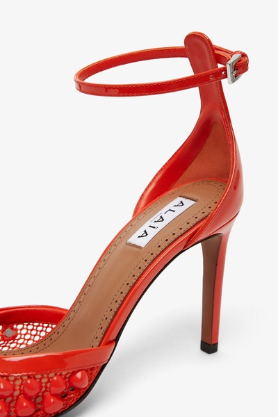 Studded mesh and leather pumps