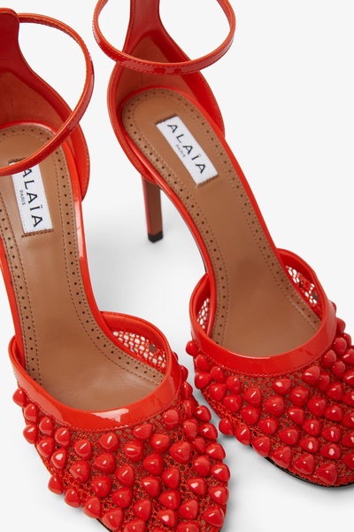 Studded mesh and leather pumps