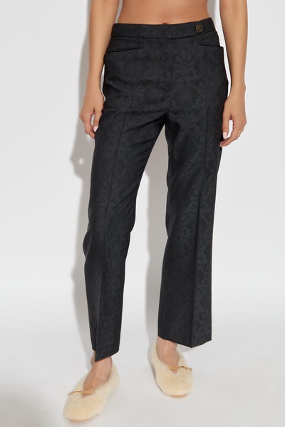 Etro Creased trousers with decorative pattern