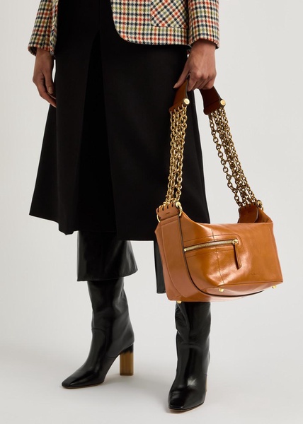 Glossed leather camera bag
