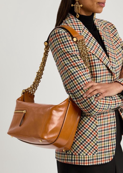 Glossed leather camera bag