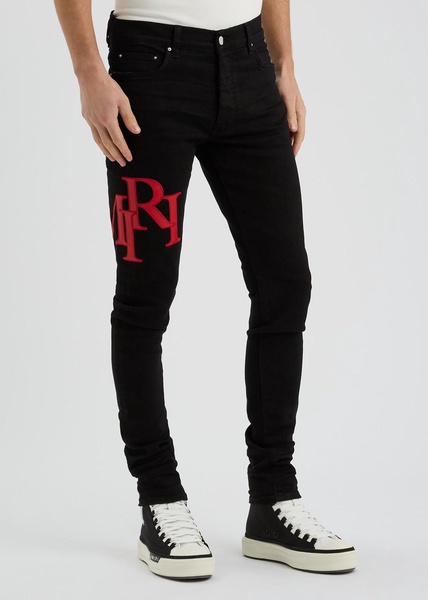 Staggered logo skinny jeans 