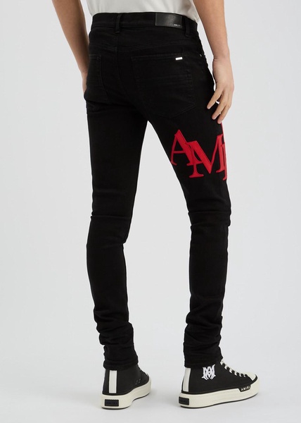 Staggered logo skinny jeans 