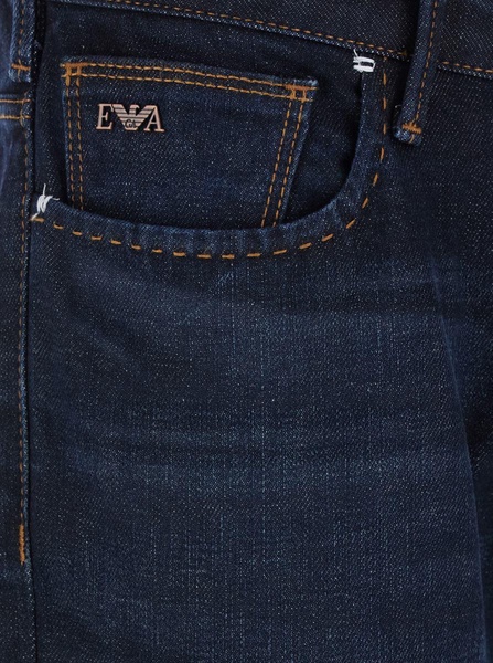 Blue Five Pocket Jeans With Logo Patch On The Back In Denim Man