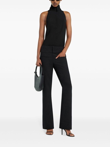 Black sleeveless turtleneck blouse by Courrèges
