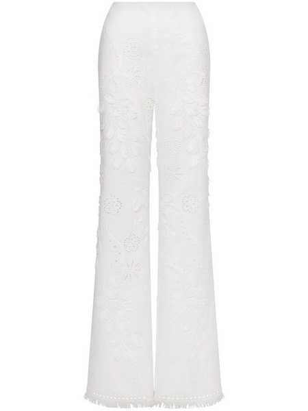 Embroidered and cut-out design trousers in cotton