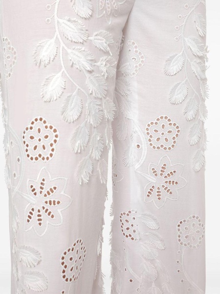 Embroidered and cut-out design trousers in cotton