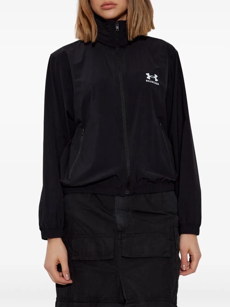 Jacket with hood hidden in collar