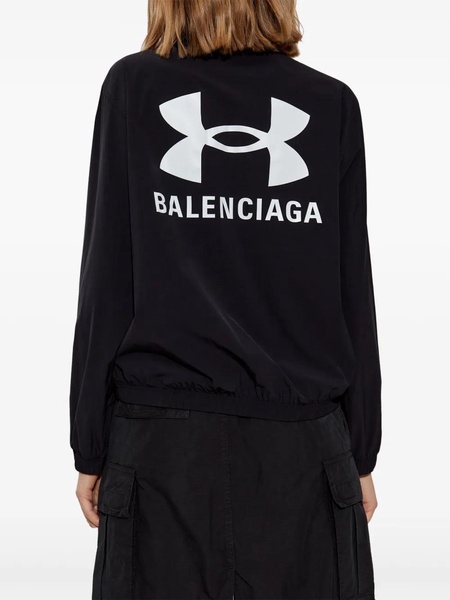 Jacket with hood hidden in collar
