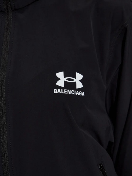 Jacket with hood hidden in collar