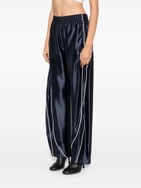 Blue sporty pants with linear details