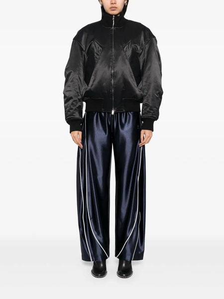 Blue sporty pants with linear details