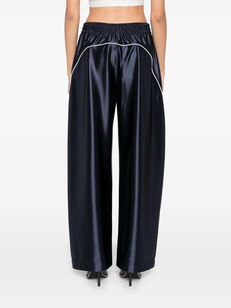 Blue sporty pants with linear details