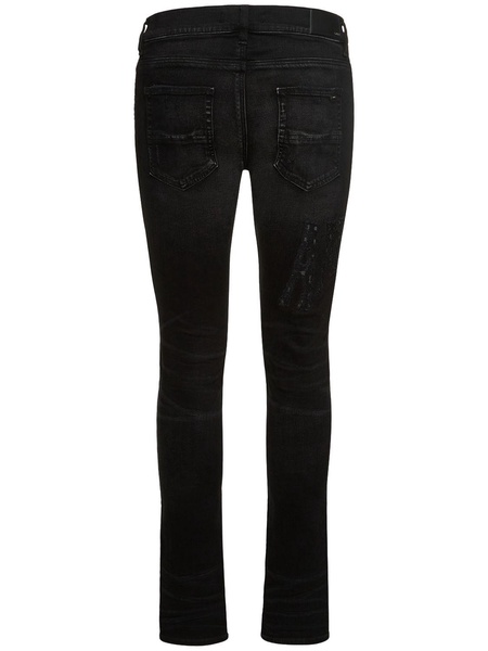 Amiri logo distressed jeans