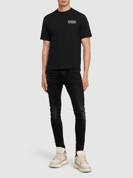 Amiri logo distressed jeans