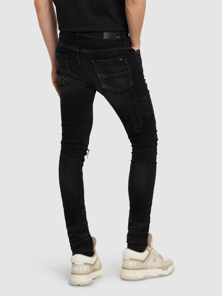 Amiri logo distressed jeans