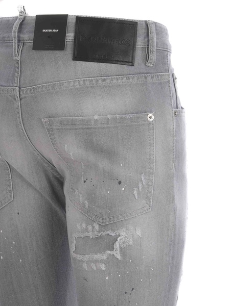 Faded ripped effect skinny jeans