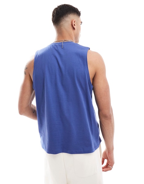 ASOS DESIGN boxy relaxed tank top in blue with chest print