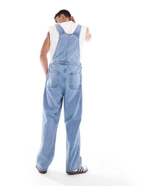 ASOS DESIGN oversized denim overalls in mid wash blue