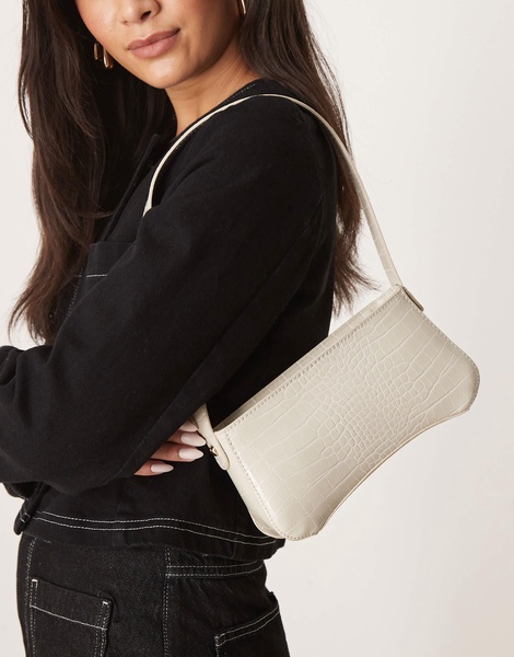 ASOS DESIGN textured curved base shoulder bag in stone