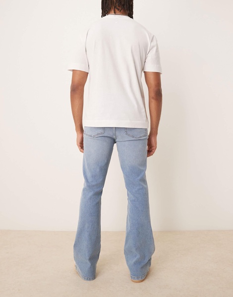 ASOS DESIGN stretch flare jeans in light wash blue
