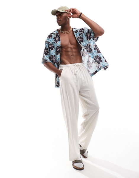 ASOS DESIGN relaxed camp collar shirt with floral retro print