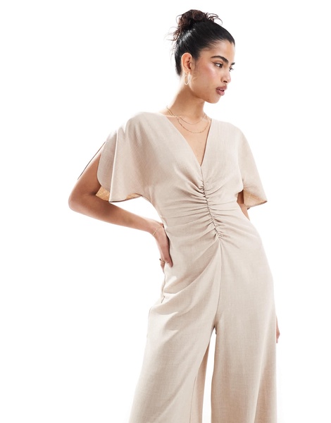 ASOS DESIGN ruched front cut out back jumpsuit in beige