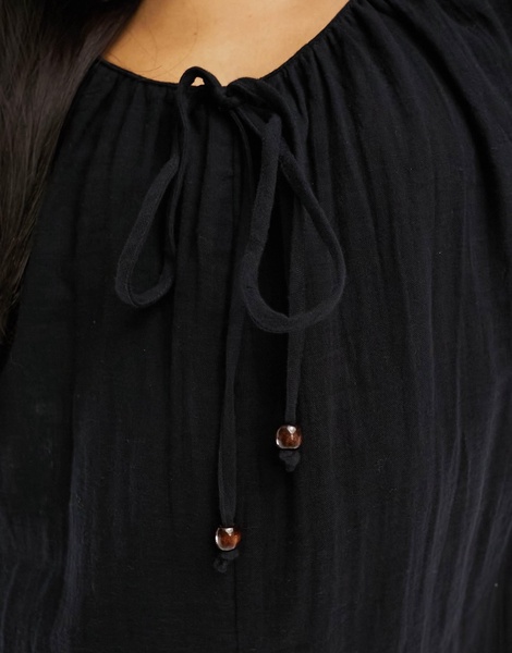 ASOS DESIGN long sleeve romper with bead detailing in black
