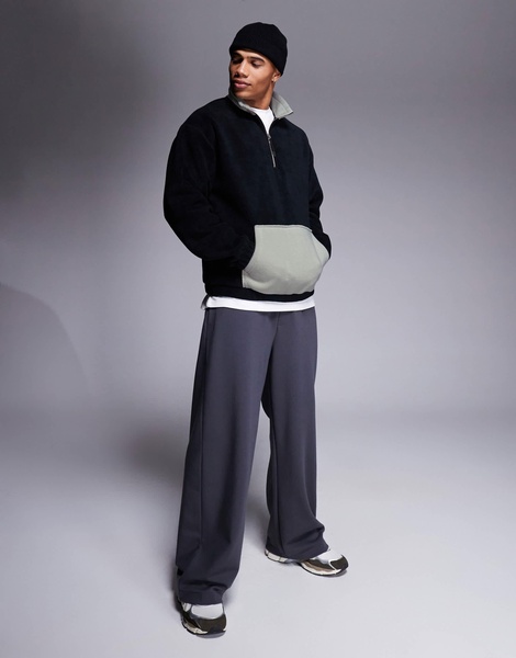 ASOS DESIGN oversized fleece sweatshirt with quarter zip and pocket in black