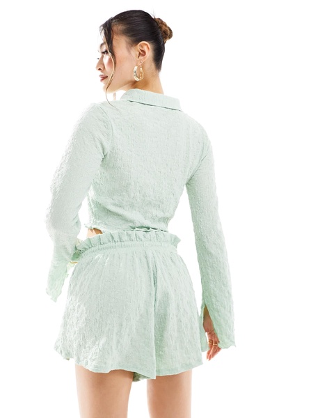 ASOS DESIGN textured flippy shorts in sage - part of a set