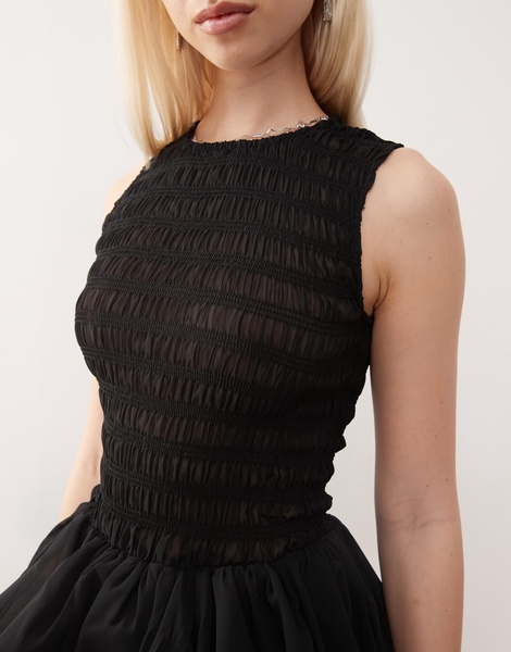 Amy Lynn Eleanor sleeveless puffball mini dress in black