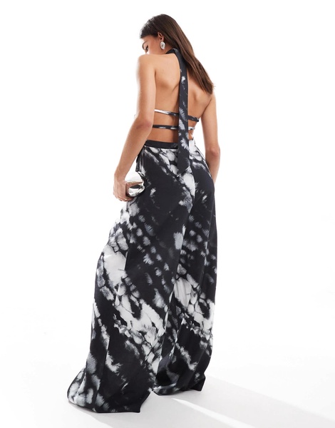 ASOS DESIGN halter neck tie detail wide leg jumpsuit in abstract print