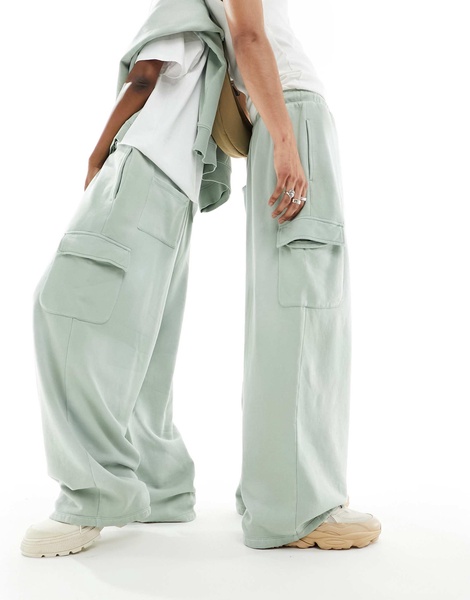 ASOS DESIGN unisex wide leg sweatpants with cargo pockets in washed green - part of a set