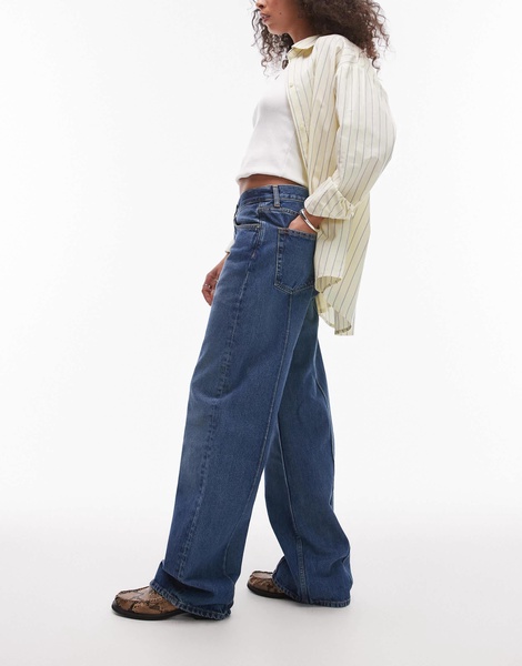 ARKET Coral high rise relaxed leg jeans with pintuck in vintage mid washed blue