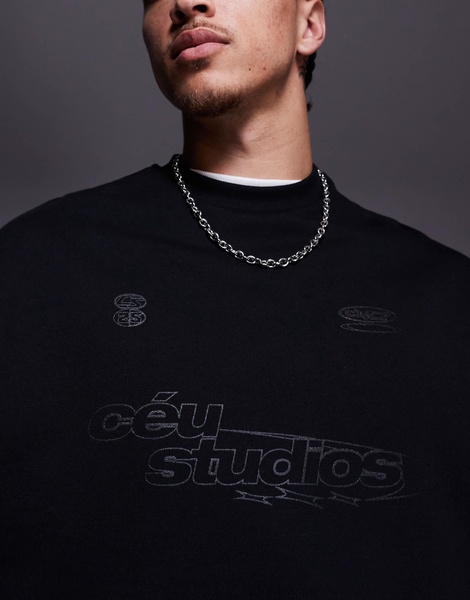 ASOS DESIGN oversized sweatshirt with metallic prints in black