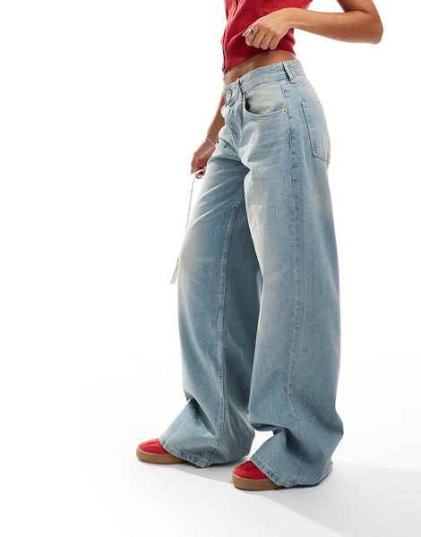 Bershka wide leg baggy jeans in dirty mid blue wash
