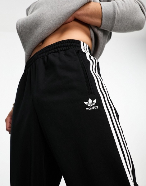 adidas Originals Adicolor firebird track pants in black & white