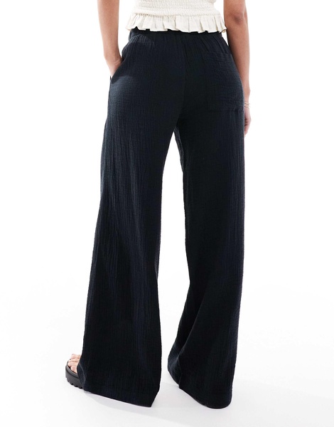 Bershka crinkle wide leg pants in black