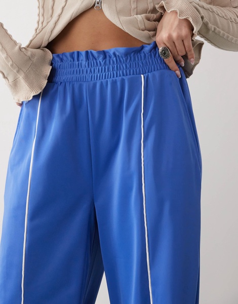 Monki wide leg pull on track pants with white piping in blue
