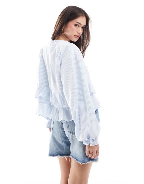 ASOS DESIGN long sleeve tie front ruffle hem top in blue stripe