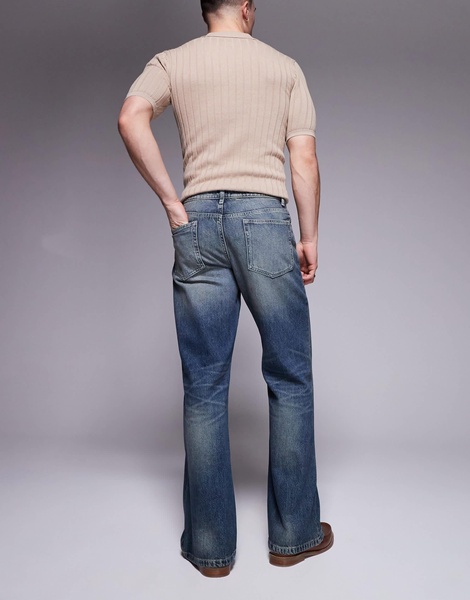 ASOS DESIGN wide flare jeans with tint in mid wash blue