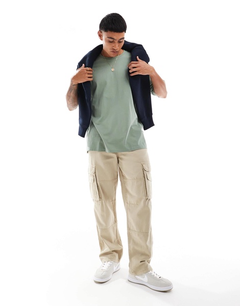 ASOS DESIGN oversized t-shirt with cartoon back print in green