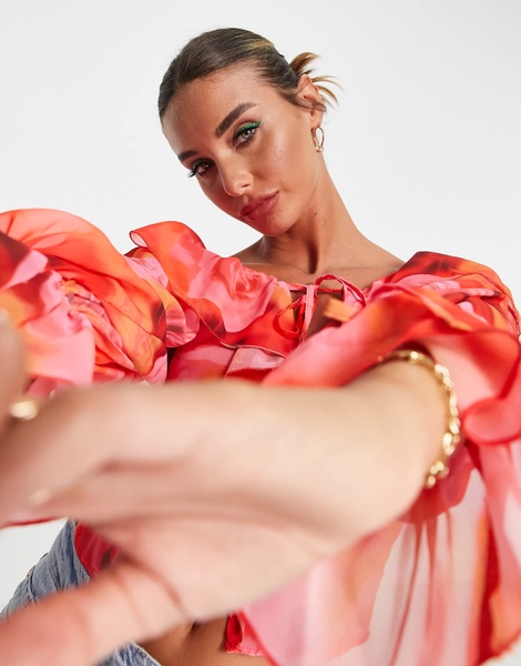 ASOS DESIGN ruffle front blouse with tie in blurred rose print