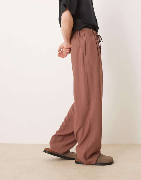 ASOS DESIGN loose fit smart pants with wide waistband and elasticated waist in brown