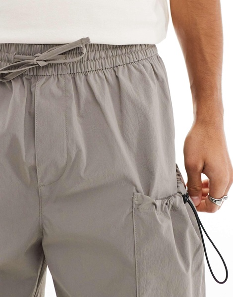 ADPT technical cargo short in beige