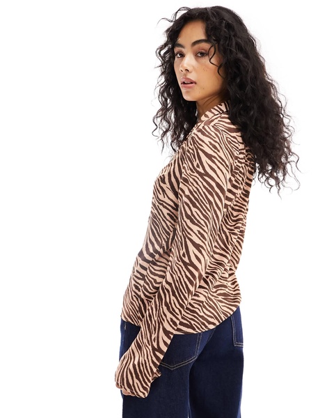 ASOS DESIGN satin tie front shirt in animal print