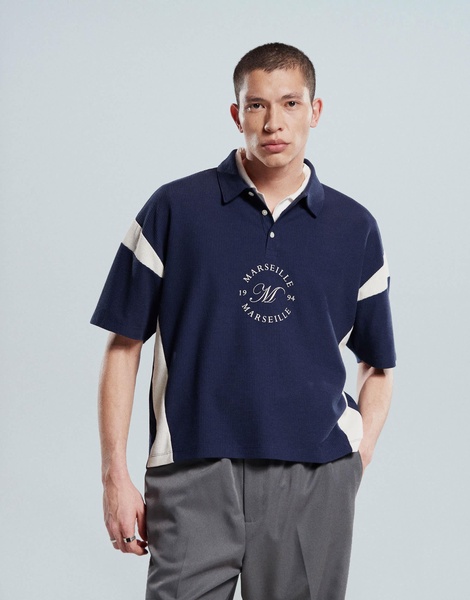 ASOS DESIGN boxy heavyweight 230gsm waffle texture oversized polo with paneling and chest print in navy