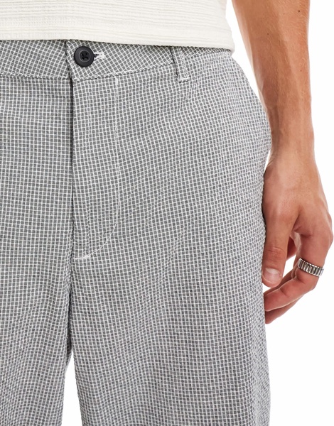 ASOS DESIGN baggy chino pants in black and white textured micro plaid