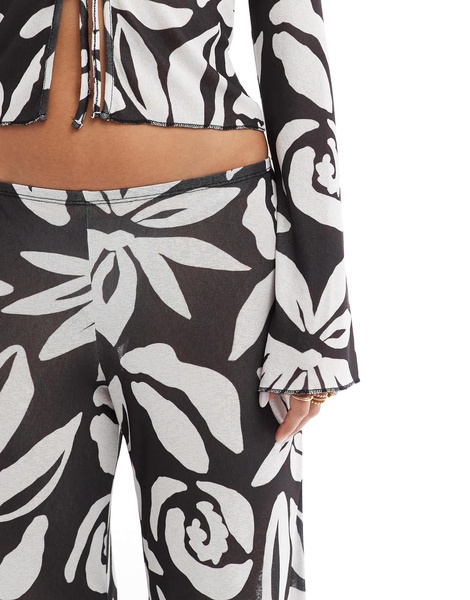 ASOS DESIGN textured mesh wide leg pants in black and white oversized floral - part of a set