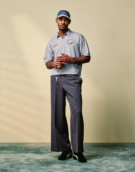 ASOS DESIGN boxy oversized zipped polo with sports graphic in gray heather rib